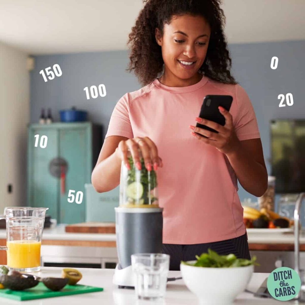 woman wondering how many carbs per day in her kitchen