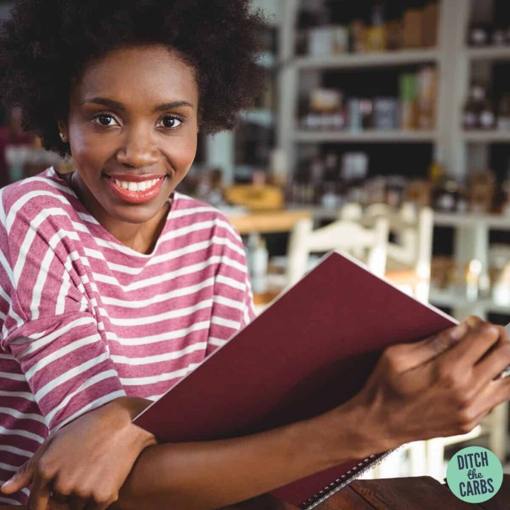 woman reading a menu